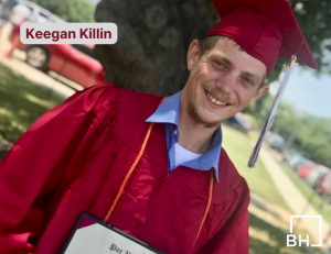 man in cap and gown