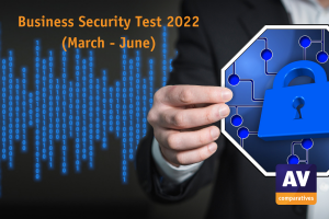 The photo shows a hand holding up a sign with a blue lock on it. In the background is a screen with a binary code. In the photo is inserted the logo of AV-Comparatives and the text Business Security Test 2022 (March-June).