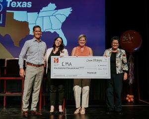 San Antonio Express-News Publisher Mark Medici, VP Lisa Gillespie, and HearstLab Chairwoman Eve Burton stand with Ema Co-Founder & CEO Amanda Ducach as she accepts her $100,000 check.