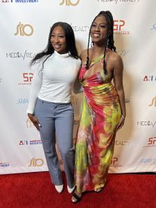 Tosha Hartzog with Mycah Bacchus on the red carpet at Studio Place
