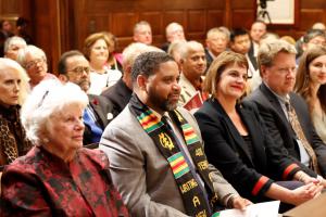 Multifaith and multiethnic attendees supporting advocates for freedom